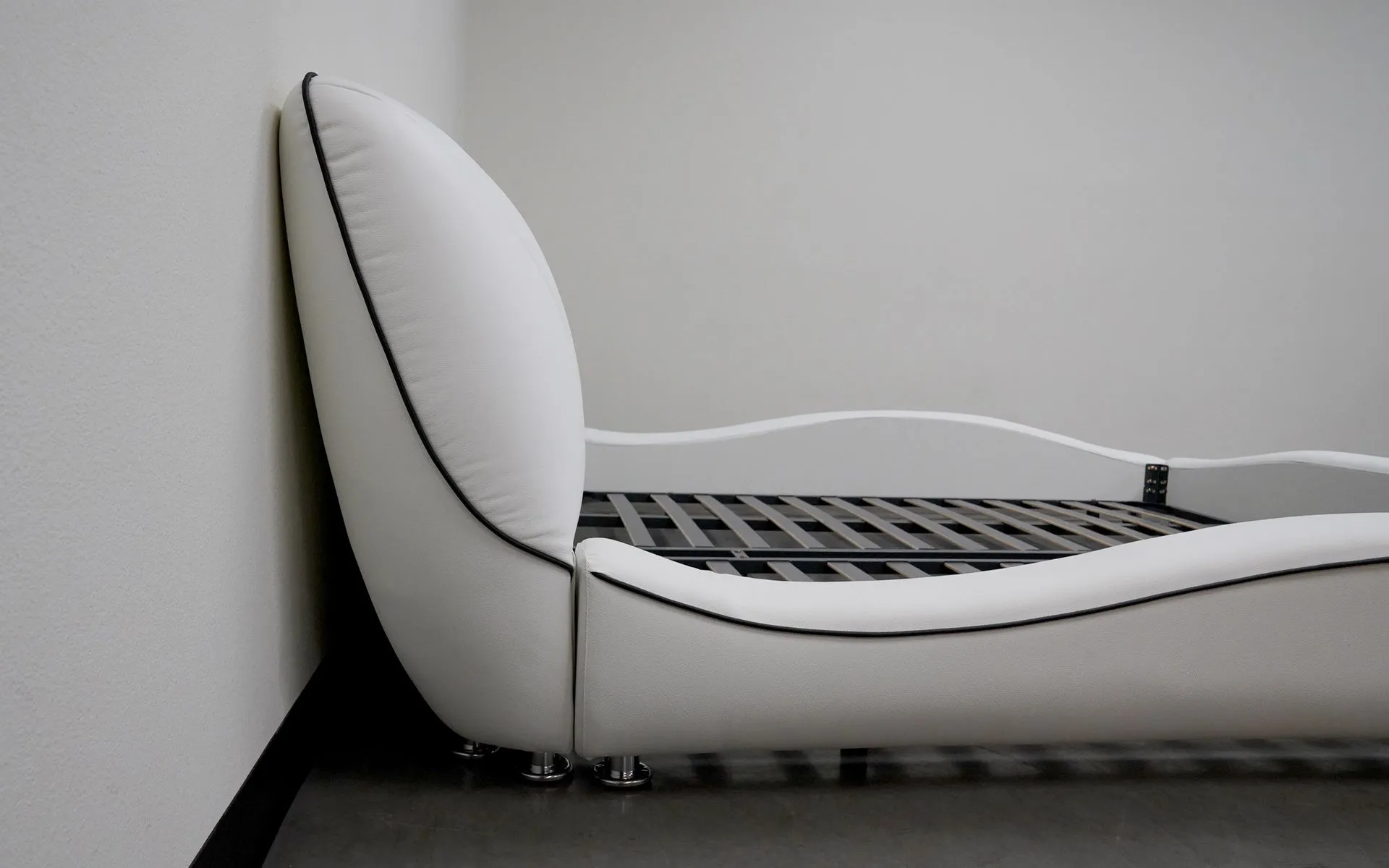 Dax Modern Curved Leather Bed